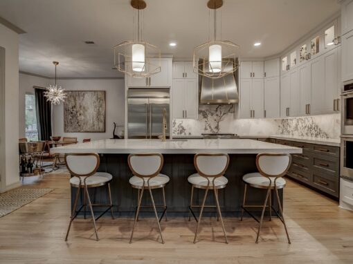 Elegant, modern kitchen remodel near Fort Worth, TX with two-toned cabinets and real wood floors