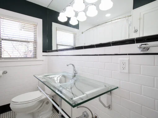 Historic hall bathroom remodel in Fort Worth, TX with historically-accurate subway tile wainscoting