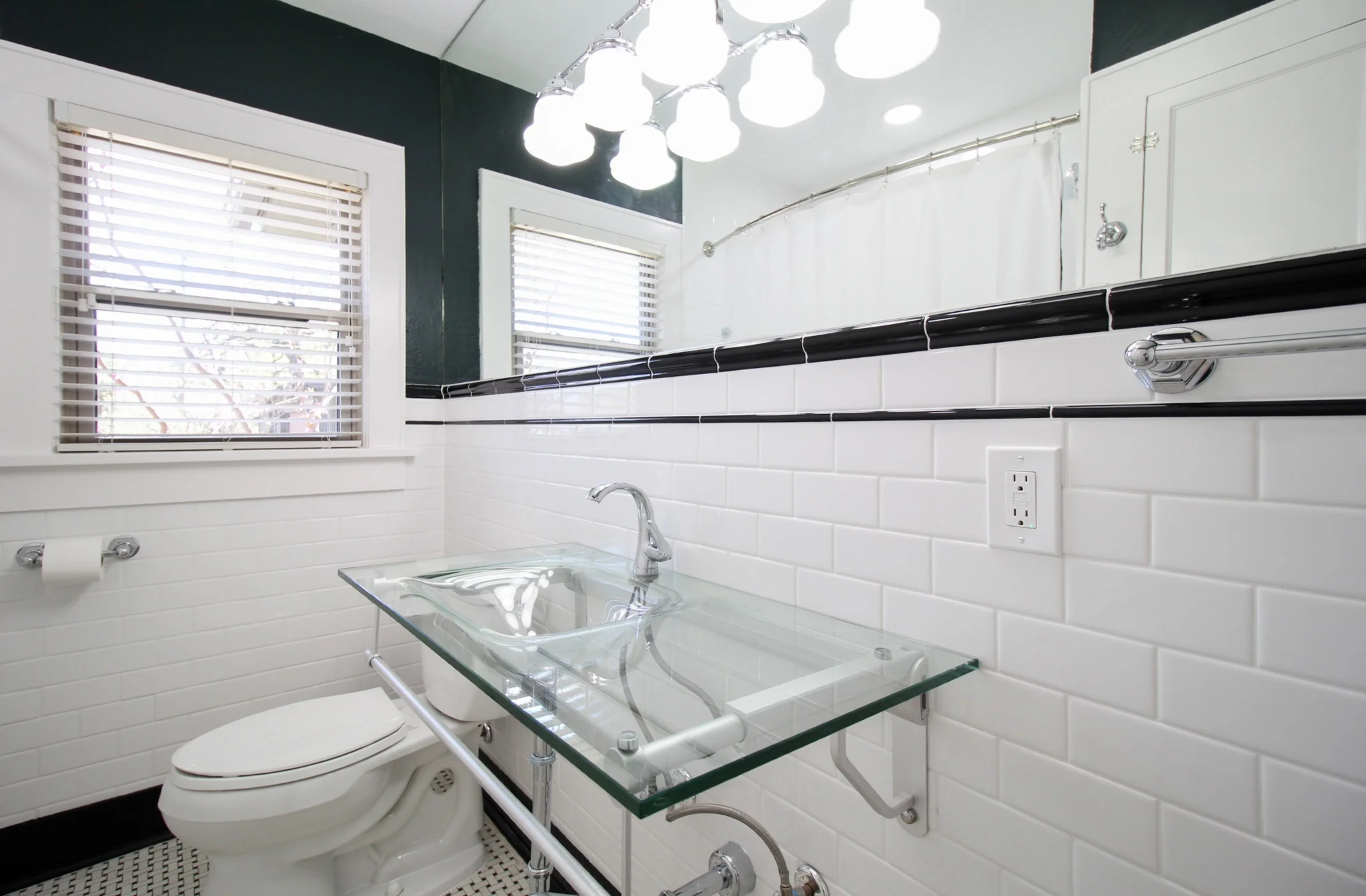 Historic hall bathroom remodel in Fort Worth, TX with historically-accurate subway tile wainscoting