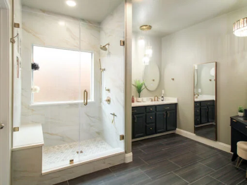 Elegant bathroom remodel in Burleson, TX with cabinet paint and custom tile