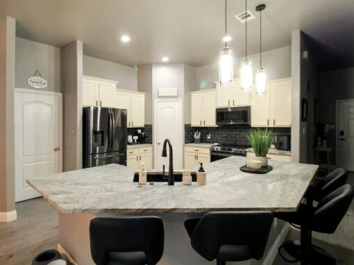 Kitchen refresh in Burleson, TX with cabinet paint and granite countertops