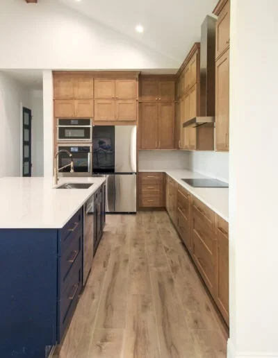 Two-toned kitchen in a whole house renovation in Azle, TX with a large island